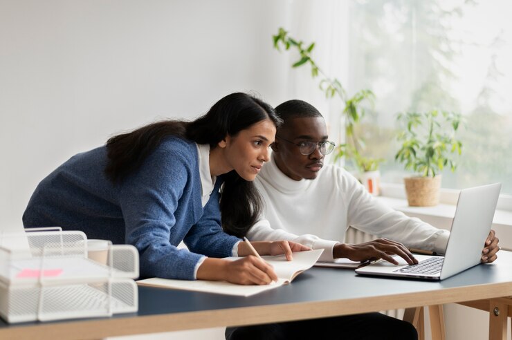 people-practicing-social-integration-workspace_23-2149405380